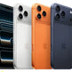 Four iPhone models in different colors on a white background