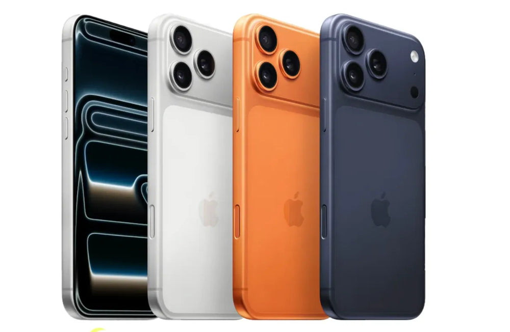 Four iPhone models in different colors on a white background